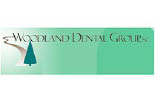 WOODLAND DENTAL logo
