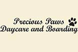 PRECIOUS PAWS DAYCARE & BOARDING logo