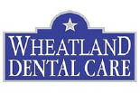 WHEATLAND DENTAL CARE logo