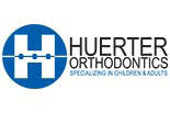 HUERTER ORTHODONTICS logo