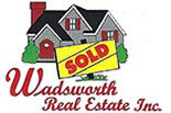 WADSWORTH REAL ESTATE logo