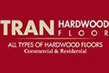 TRAN HARDWOOD FLOORS logo