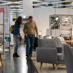 3 Direct Mail Tips to Maximize Your Labor Day Sales Mid adoult couple walking at a furniture store while talking and smiling