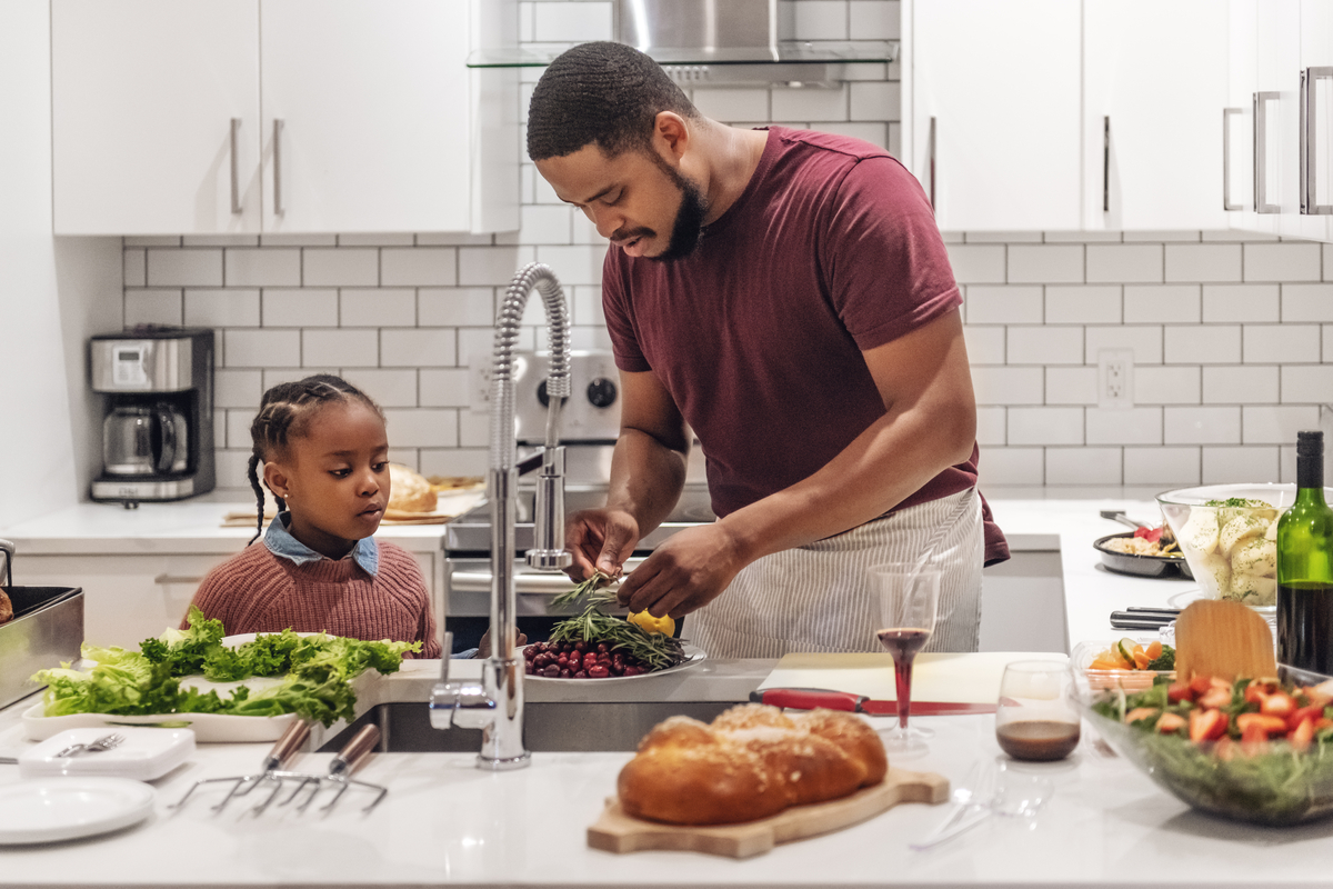 dad cooks for his child