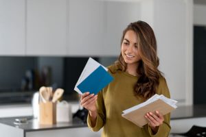 woman opening her mail