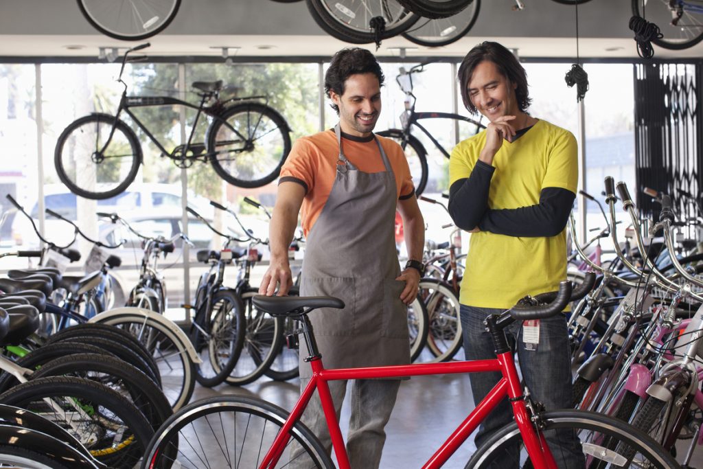 Valpak advertising 101 men discussing bikes