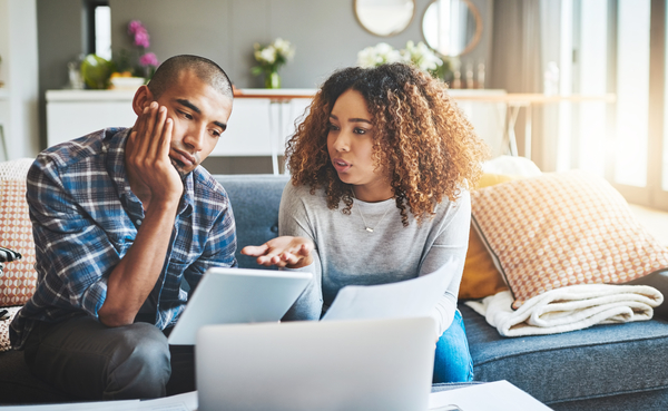a couple working on taxes