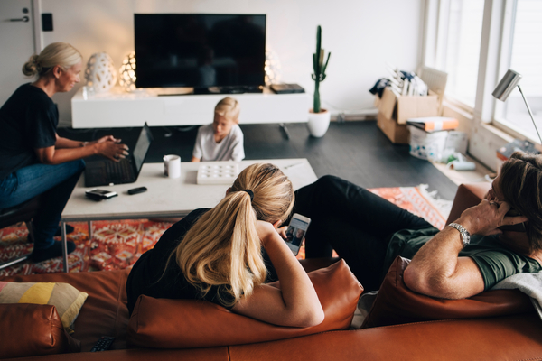 image of family hanging out in living room