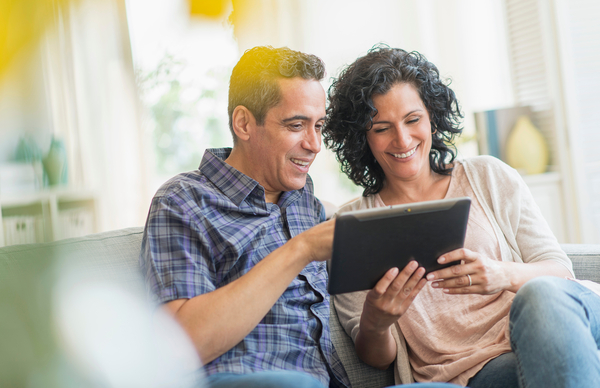 USA, New Jersey, Jersey City, Couple using digital tablet together